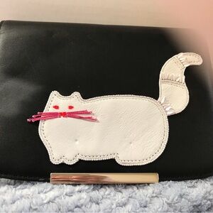 Kate Spade Make It Mine Interchangeable Cat Flap.